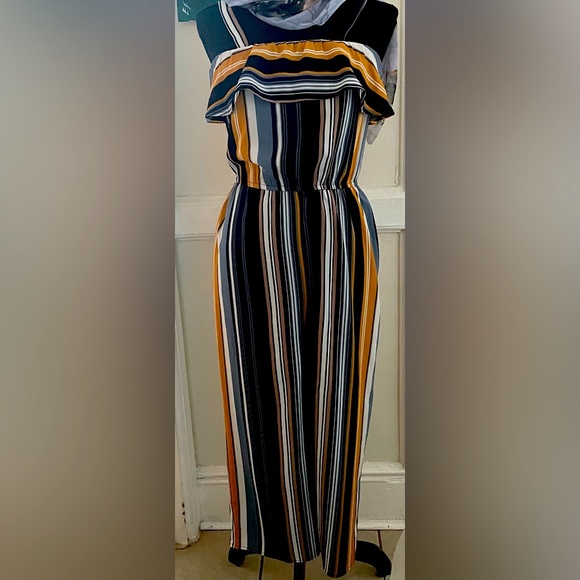 A multicolor jumpsuit and not refund after purchased. - Picture 1 of 2